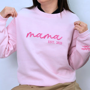 New Mama wearing Light Pink Sweatshirt with 'EST. 2025' embroidery and Kid's name on Sleeve, a meaningful gift for mama