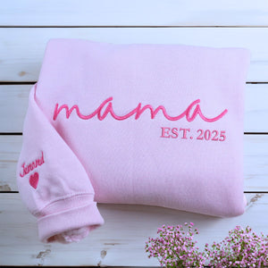 Folded Light Pink Mama Sweatshirt with 'EST. 2025' embroidery and Kid's name on Sleeve, a meaningful gift for mama