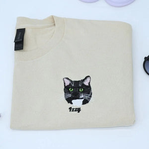 Custom white t-shirt with a embroidered cat dog face portrait, personalized from a customer photo