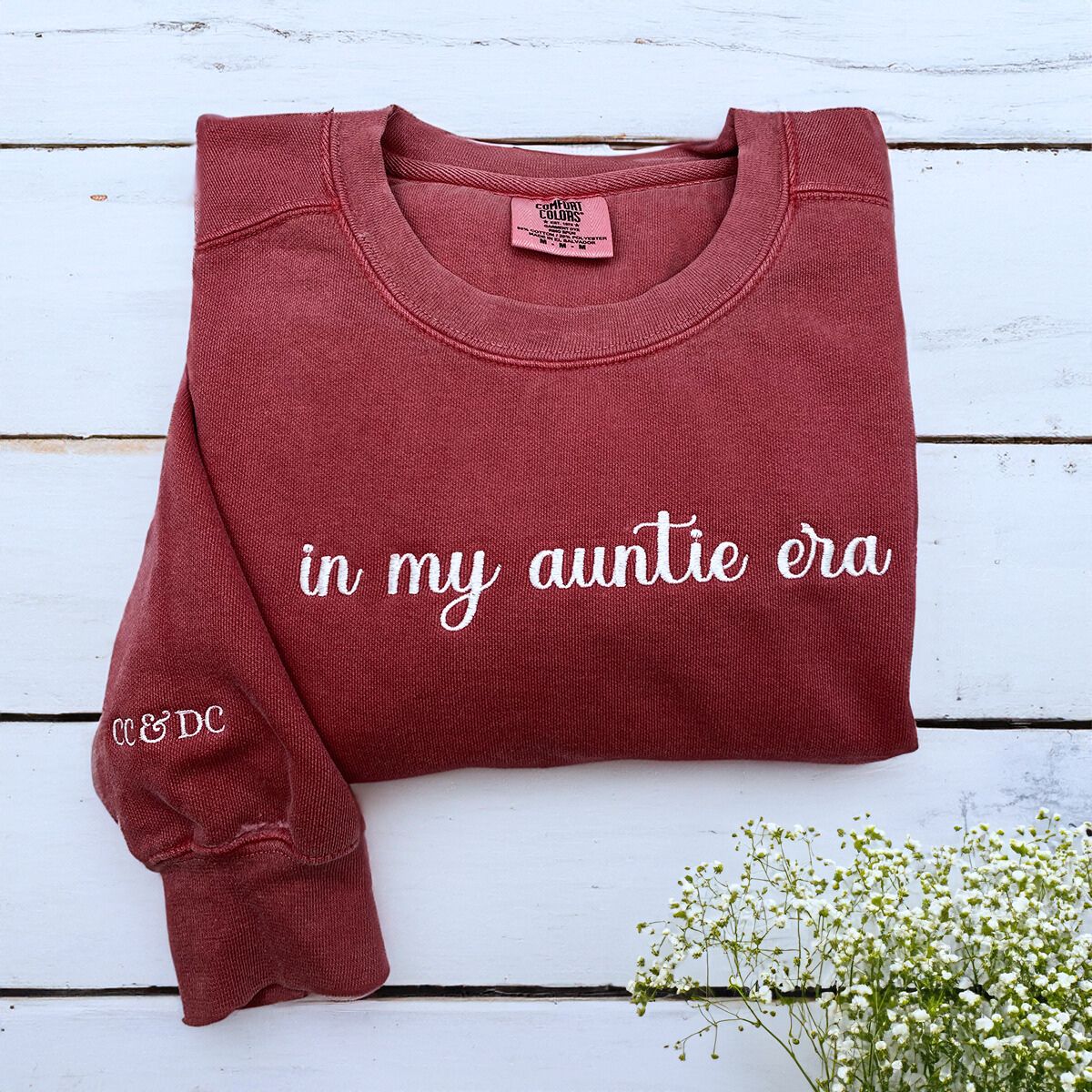 Crimson Auntie Era Sweatshirt with Niece nephew name on sleeve, a meaningful and cozy gift for Auntie
