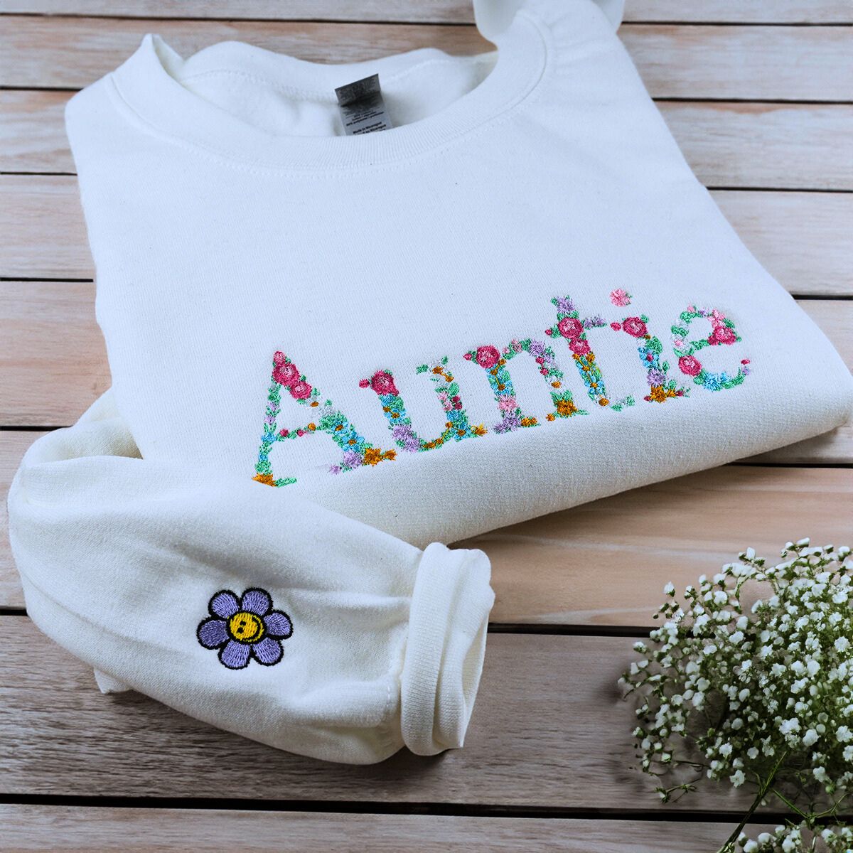 White Auntie Floral Swearshirt with Cute Icon on Sleeve, a meaningful and cozy gift for Auntie