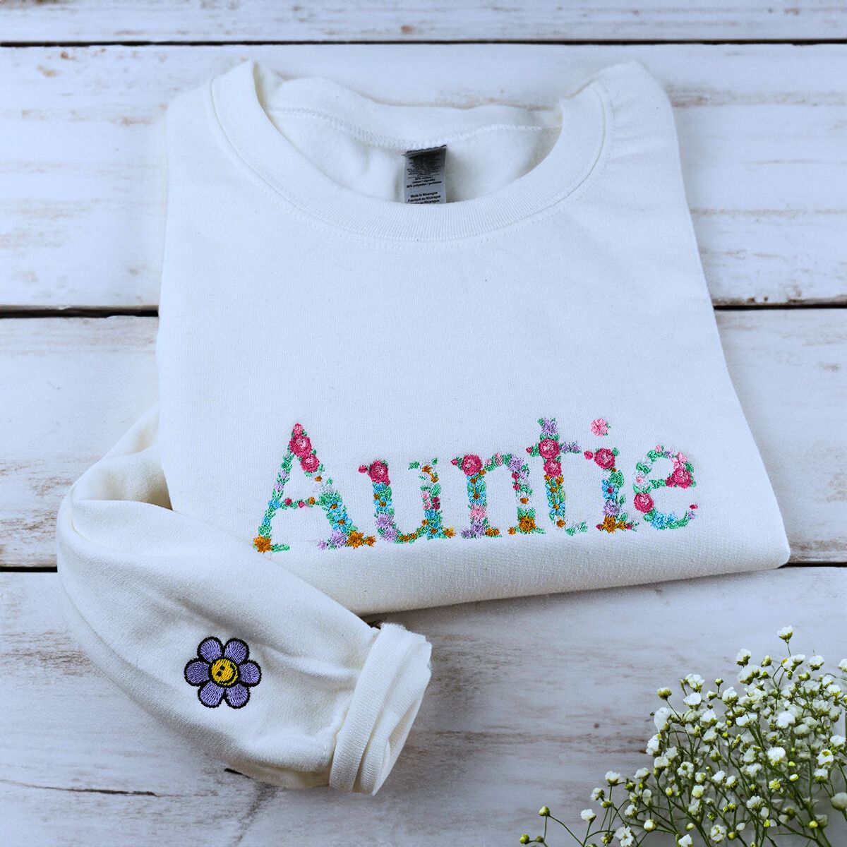 White Auntie Floral Swearshirt with Cute Icon on Sleeve, a meaningful and cozy gift for Auntie