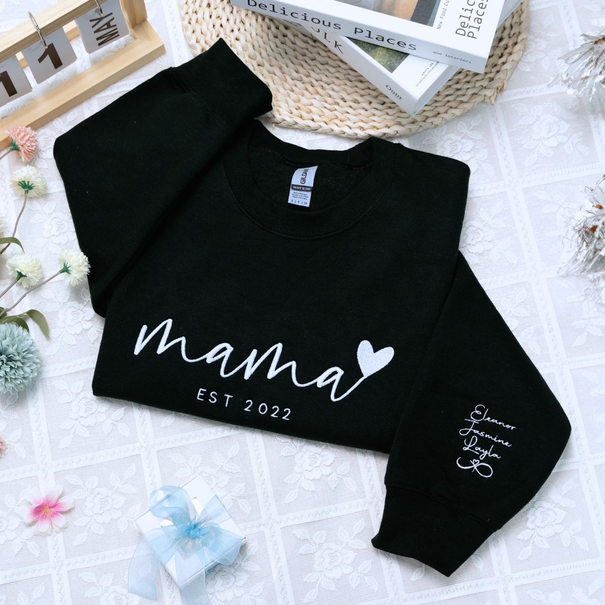 Folded Black Mama Sweatshirt with 'EST. 2022' Embroidery, a meaningful and cozy gift for Mama
