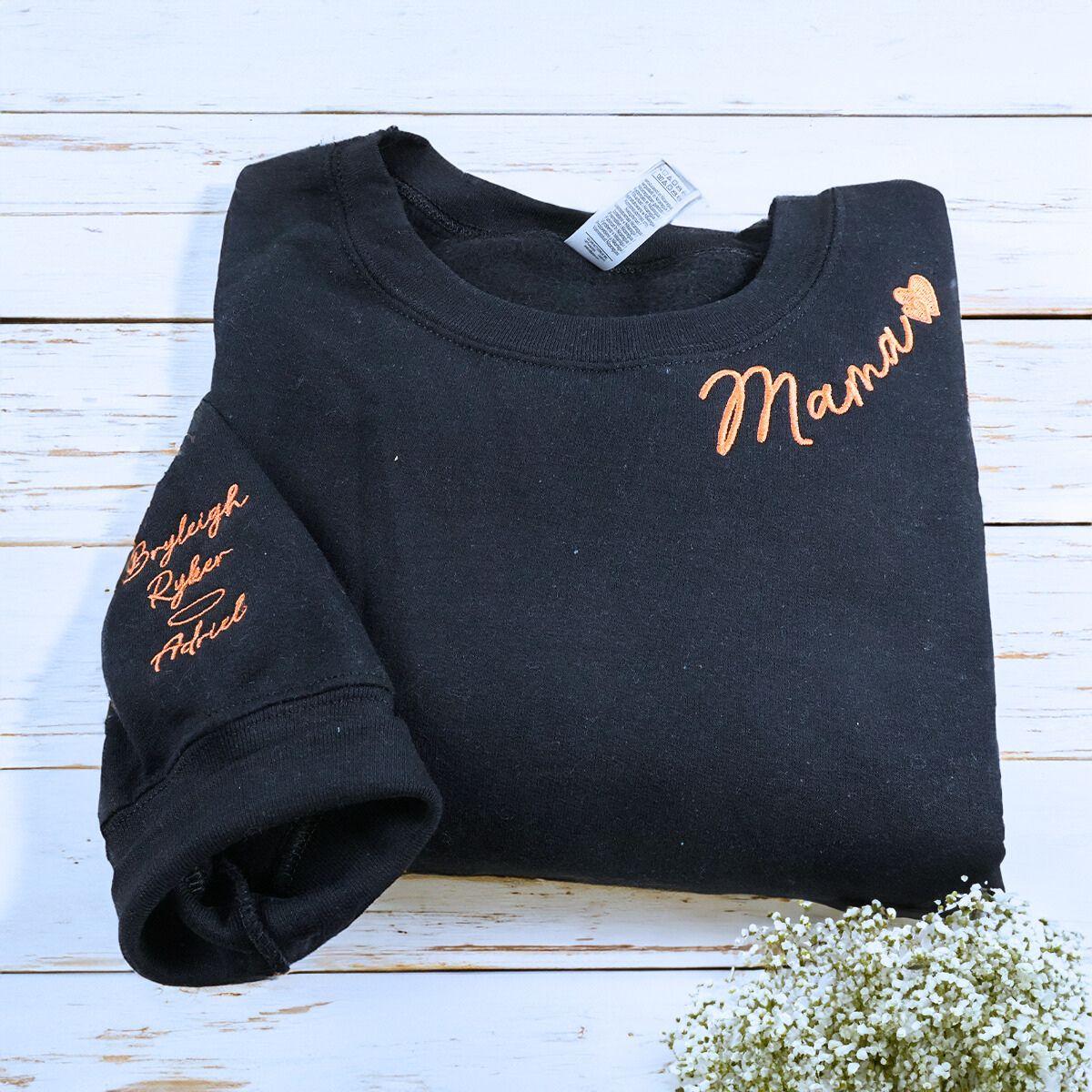 Folded Black Mama Sweatshirt with kids' Names on Sleeve, A Meaningful and cozy Gift for Mama