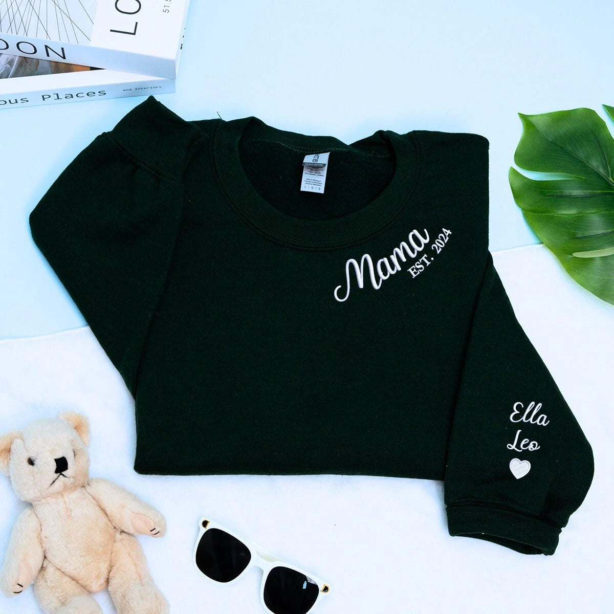Black Mama Sweatshirt with 'Est. 2024' embroidery with kids names on sleeve, a meaningful and cozy gift for Mama