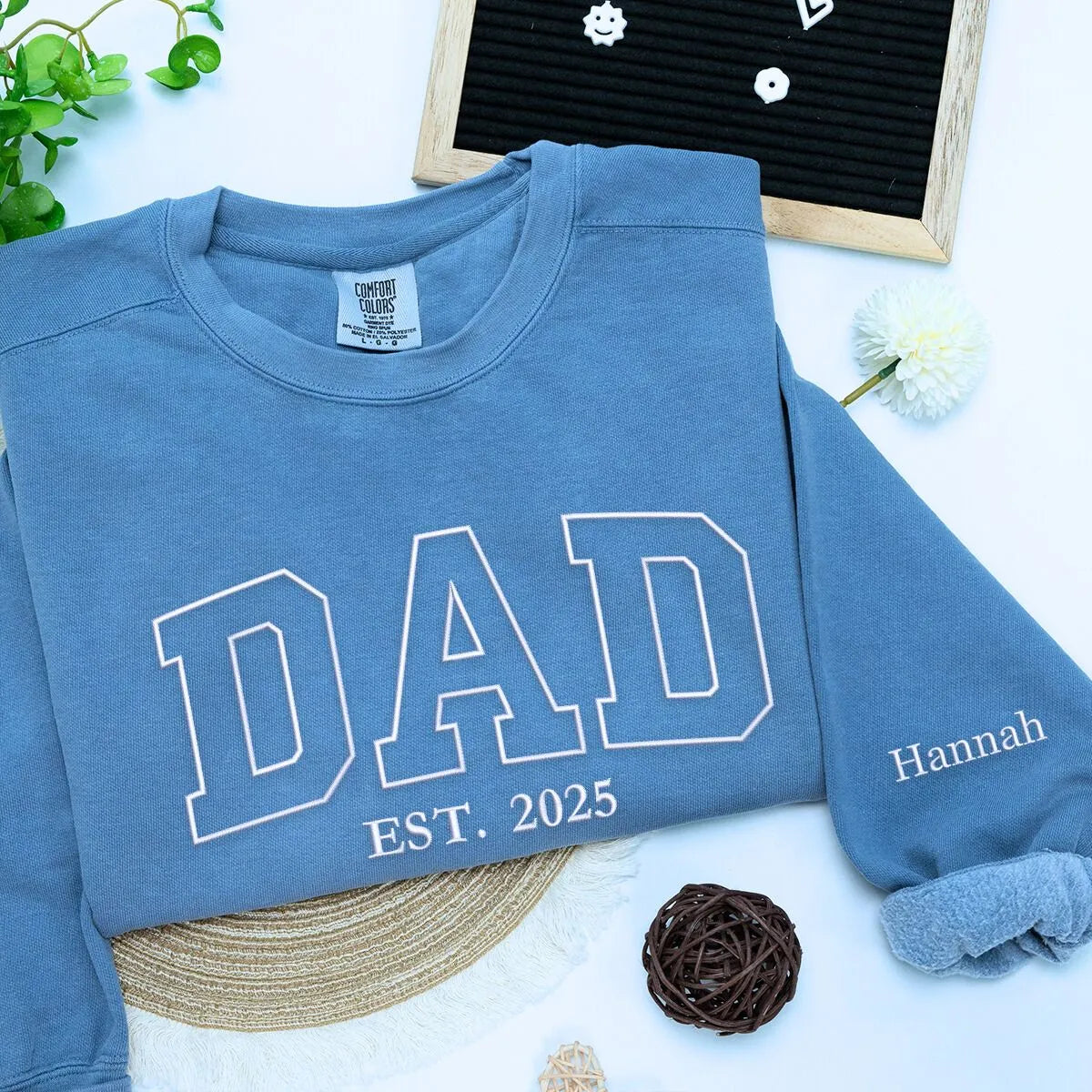 Blue Dad Sweatshirt with 'Est. 2025' embroidery and kids names on sleeve, a meaningful and cozy gift for dad