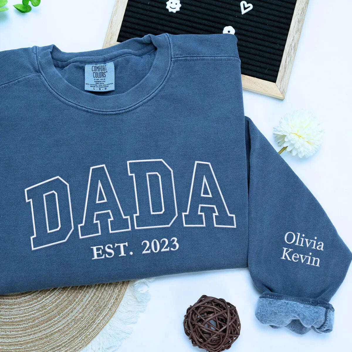 Blue Jean Dada Sweatshirt with 'Est. 2023' embroidery and kids names on sleeve, a meaningful and cozy gift for dad