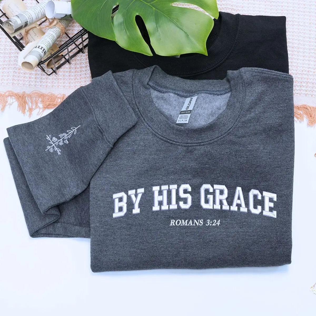 Custom embroidered Christian hoodie with floral cross on sleeve – faith-based fashion