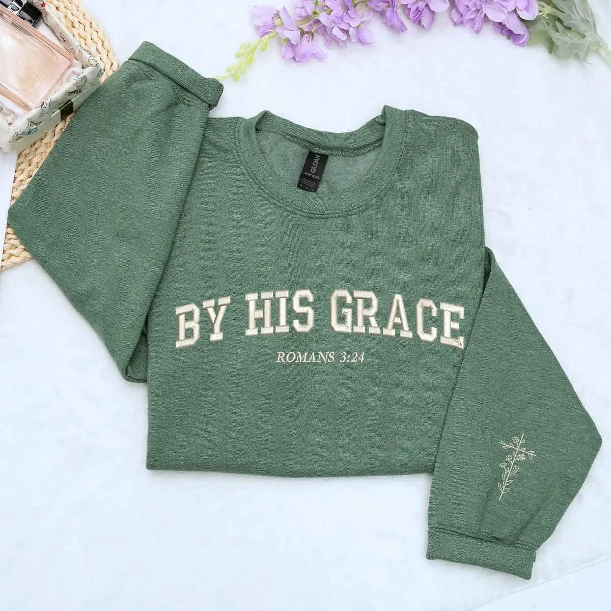 Custom embroidered Christian hoodie with floral cross on sleeve – faith-based fashion