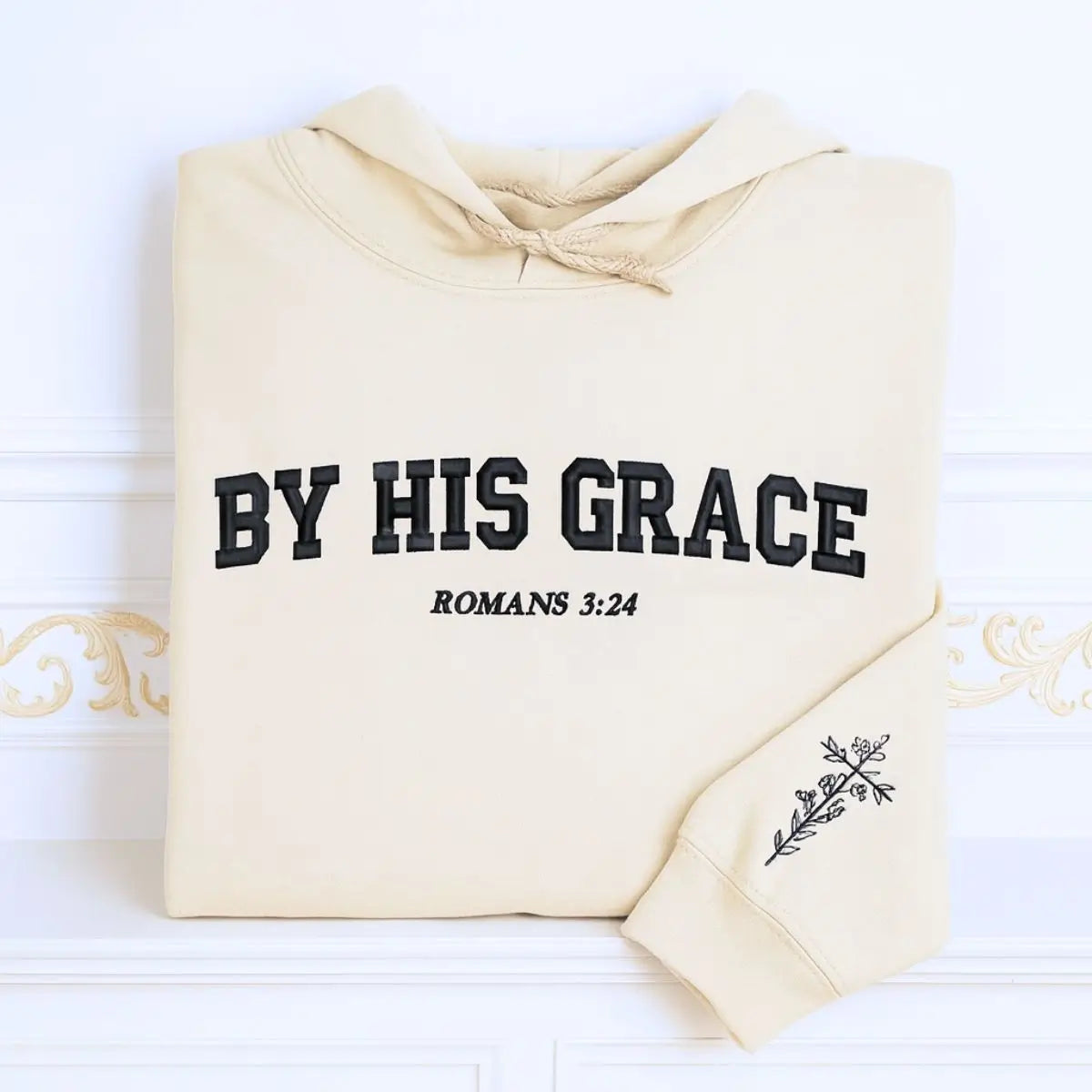 Custom embroidered Christian hoodie with floral cross on sleeve – faith-based fashion