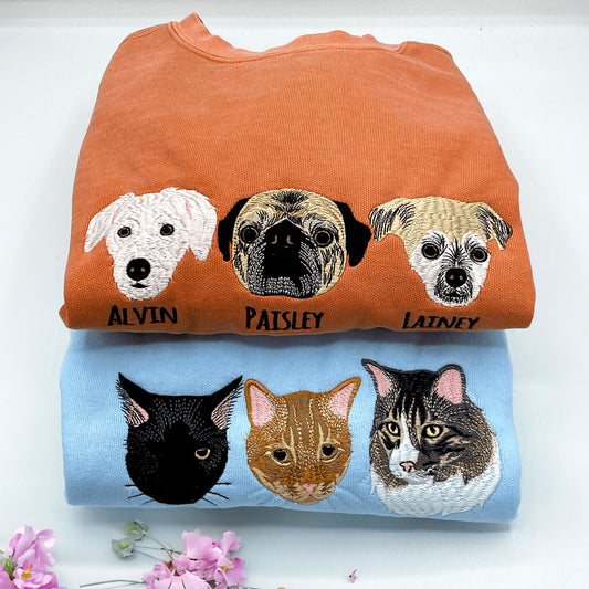 Close-up of custom embroidered dog cat portrait on a Comfort Colors® sweatshirt based on a customer photo