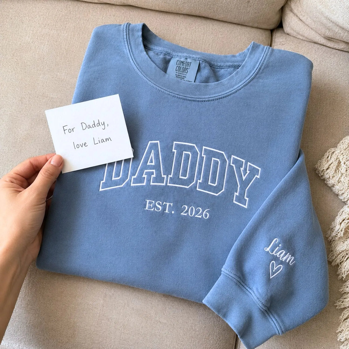 Custom embroidered Daddy Est t-shirt with high-density stitching, personalized gift for a new dad.