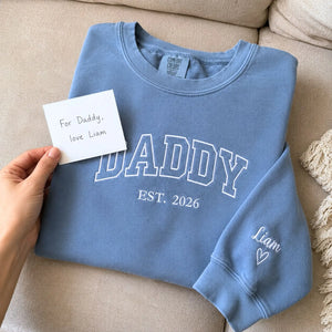 Custom embroidered Daddy Est t-shirt with high-density stitching, personalized gift for a new dad.