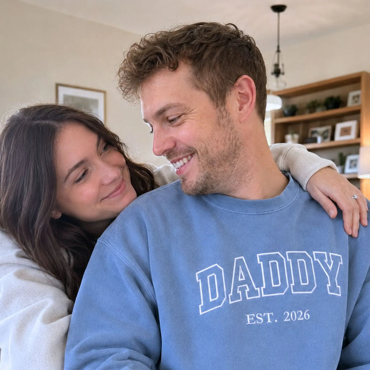 Custom embroidered Daddy Est t-shirt with high-density stitching, personalized gift for a new dad.
