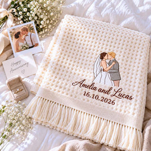 Cream waffle blanket embroidered with a custom bride and groom portrait, personalized names and wedding date.