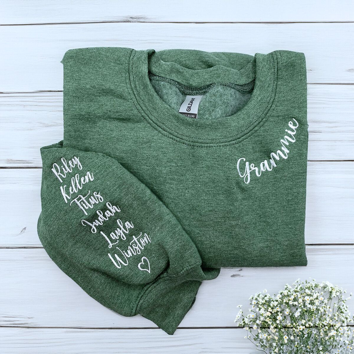 Heather Dark Green Grammie Sweatshirt with Grandkids' names and heart icon on sleeve, a meaningful and cozy gift for Grammie