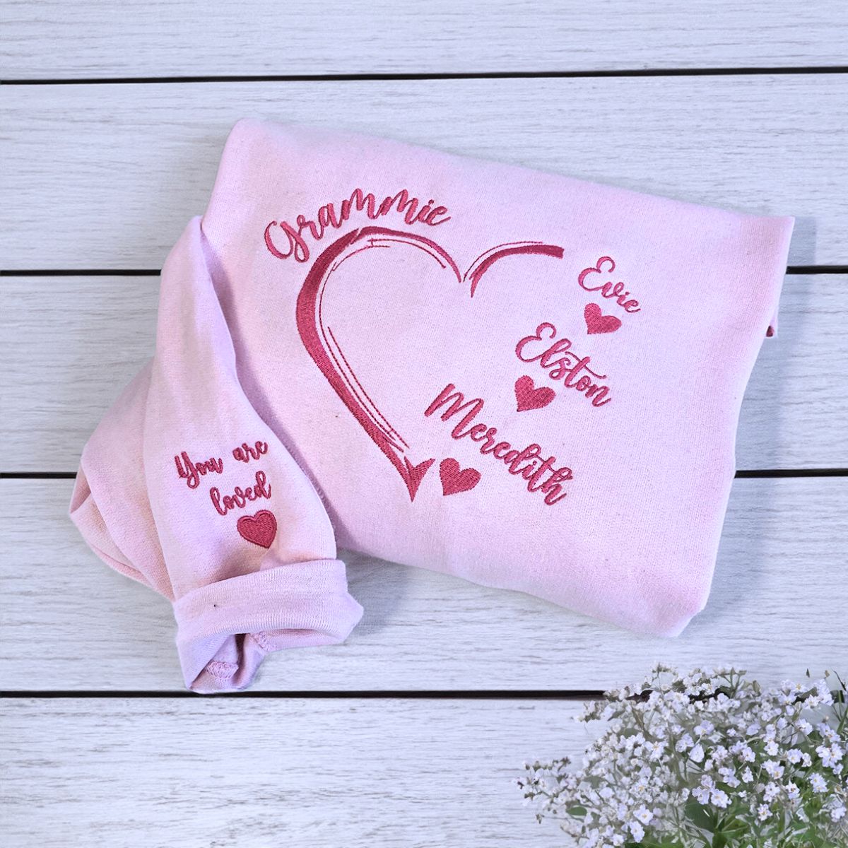 Grammie Light ink Sweatshirt with Grandkids' names and big heart on chest, a meaningful and cozy gift for Grandma