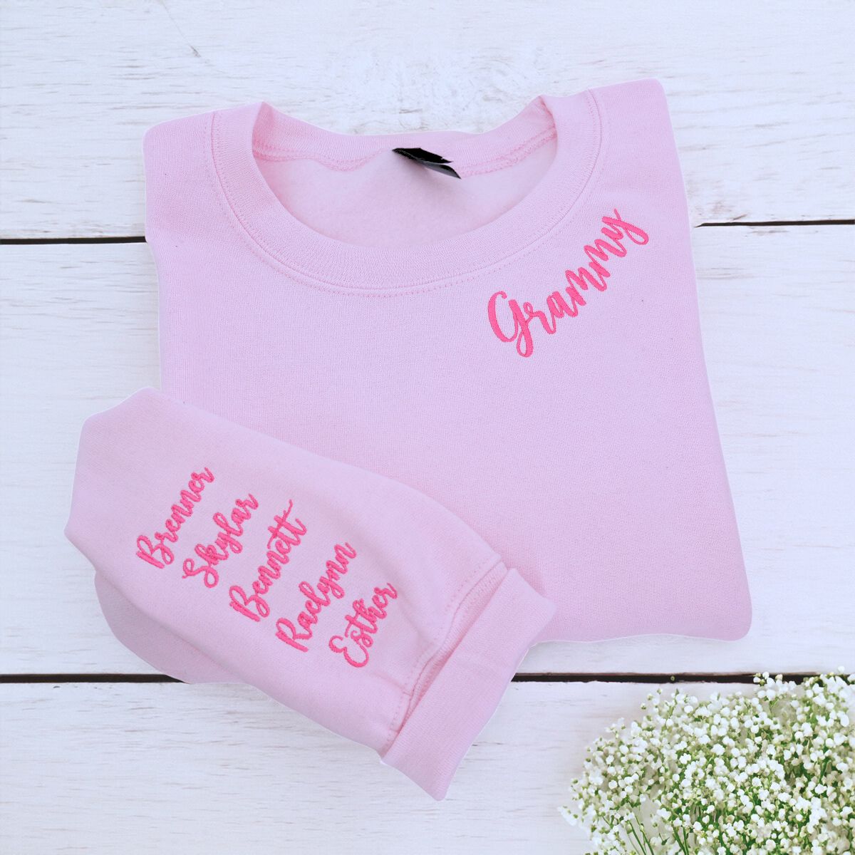 Light Pink Grammy Sweatshirt with Grandkids' Names on sleeve, a meaningful and cozy for Grammy