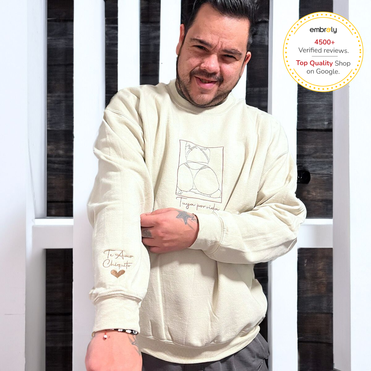 A man wearing his spicy girlfriend portrait embroidered sweatshirt , a funny gift for boyfriend husband from girlfriend wife