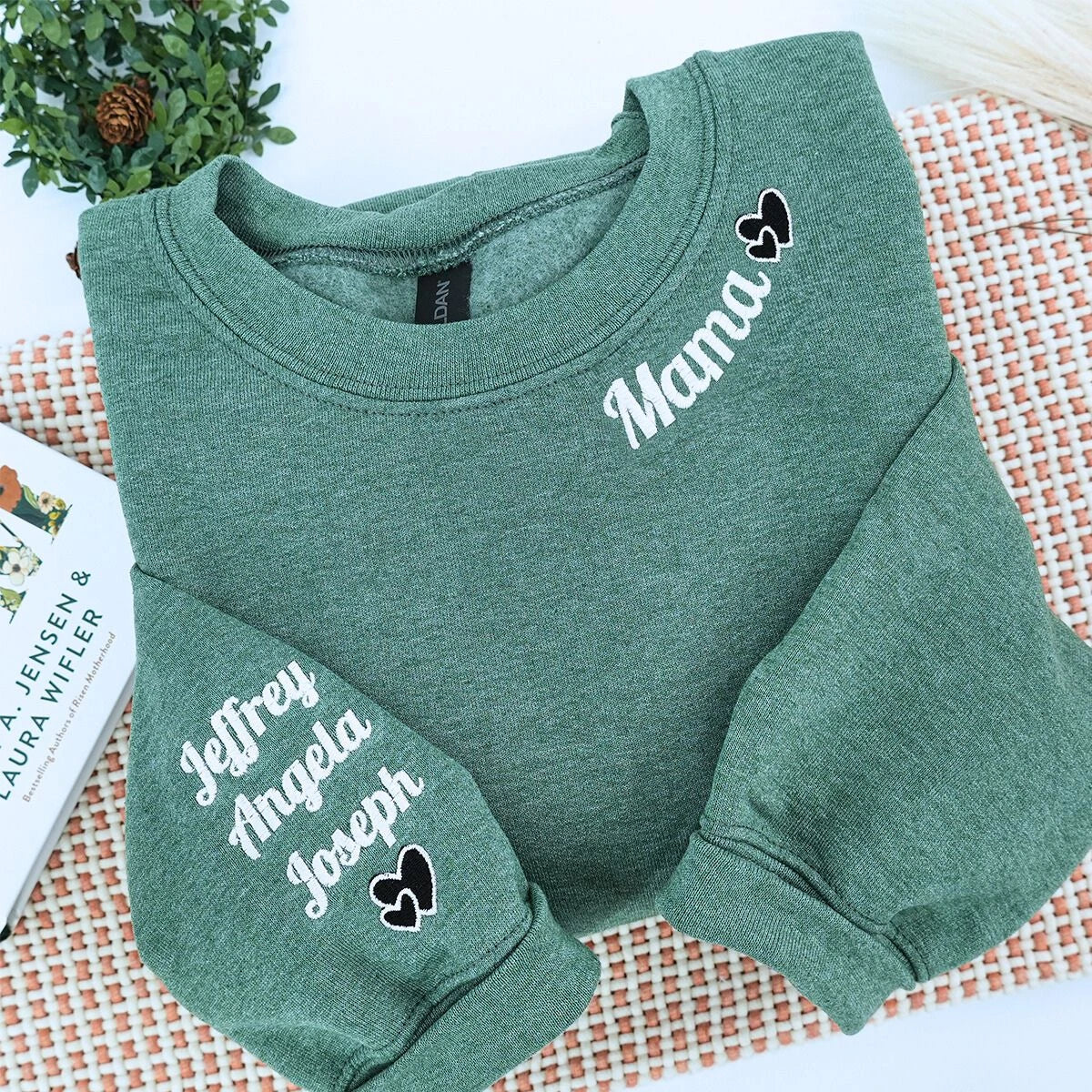 Heather Dark Green Mama Sweatshirt with heart icon and kids names on sleeve, a meaningful and cozy gift for mama