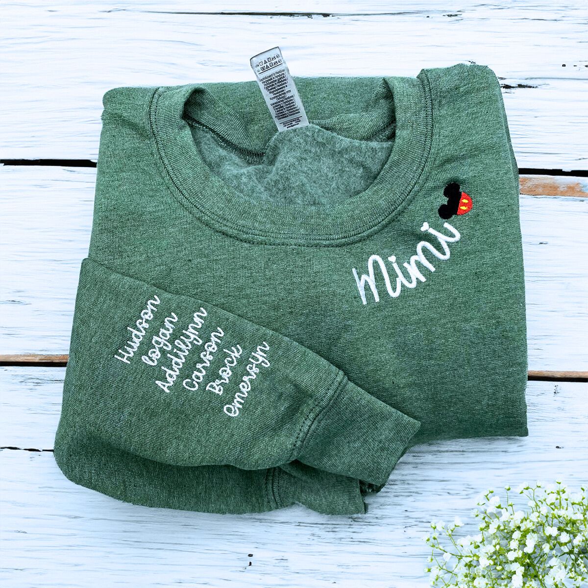 Folded Heather Dark Green Mimi Sweatshirt with Grandkids' Names on Sleeve, A Meaningful and cozy Gift for Mimi
