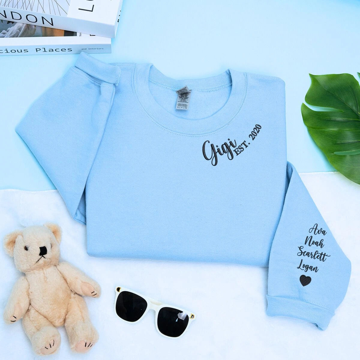Light Blue Gigi Sweatshirt with 'Est. 2020' embroidery with grandkids names on sleeve, a meaningful and cozy gift for Gigi