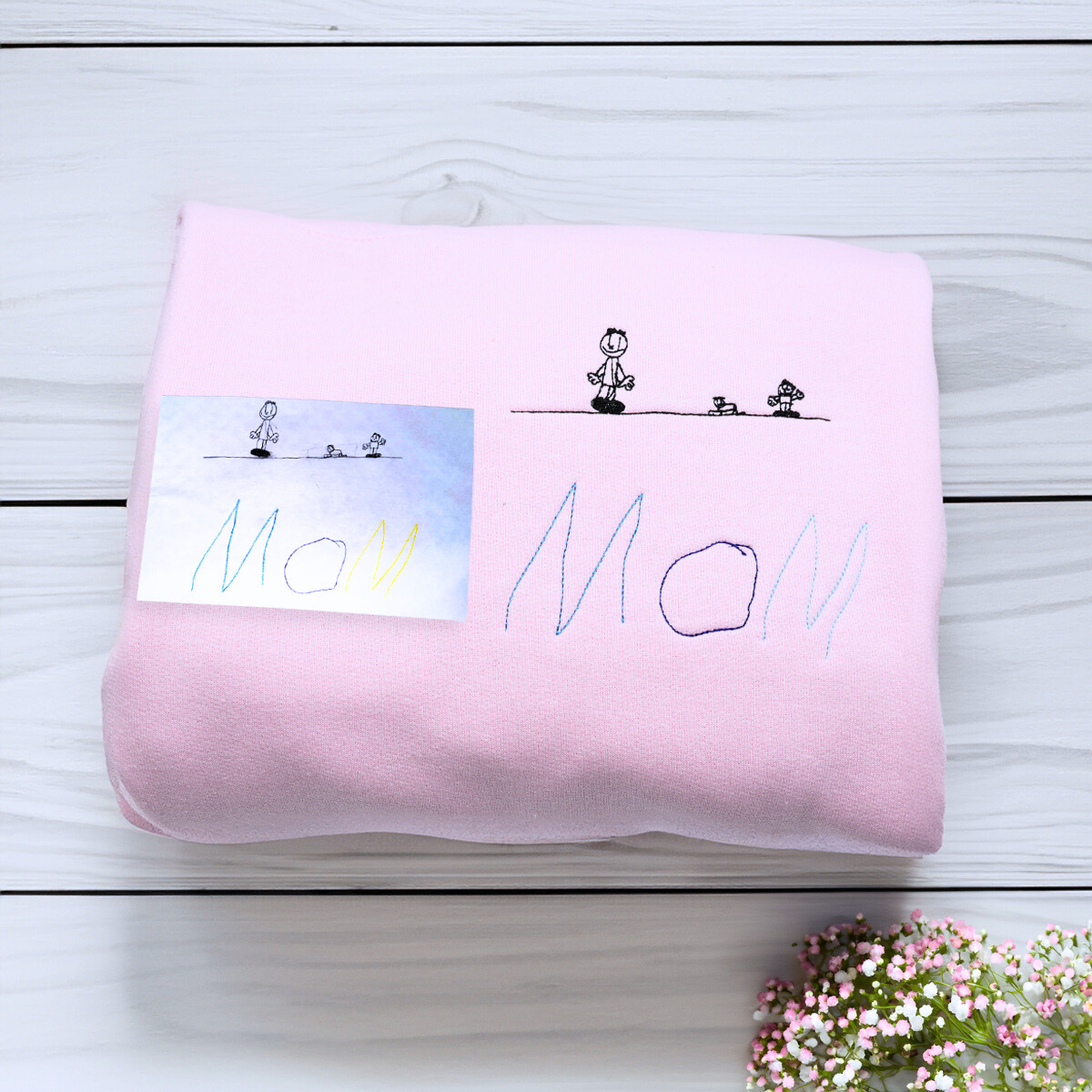 Folded Light Pink Kids Drawing Mom Embroidery Sweatshirt, a unique and cozy gift for mom mother's day