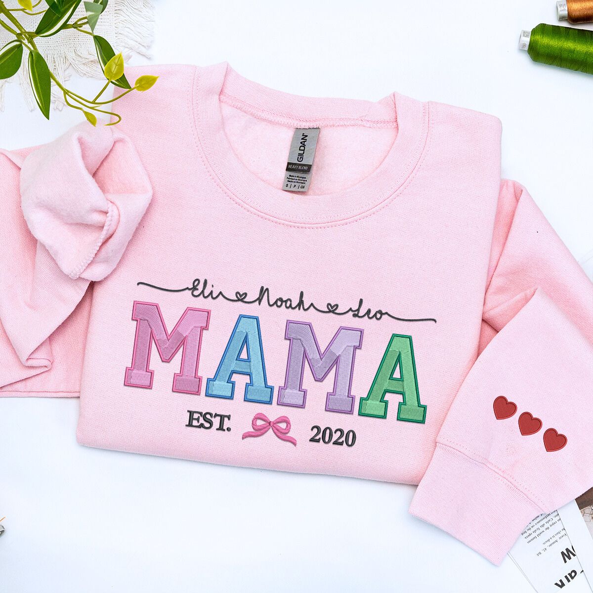Light Pink Mama Sweatshirt with 'Est. 2020' embroidery and Kids Names on chest, a meaningful and cozy gift for mama