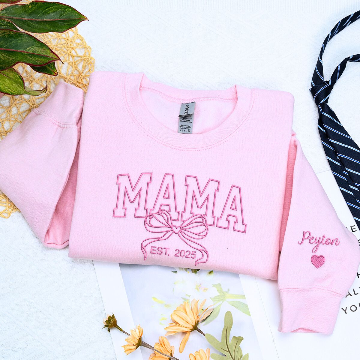 Light Pink Mama Bow Sweatshirt with 'EST. 2025' embroidery, a meaningful and cozy gift for mama.