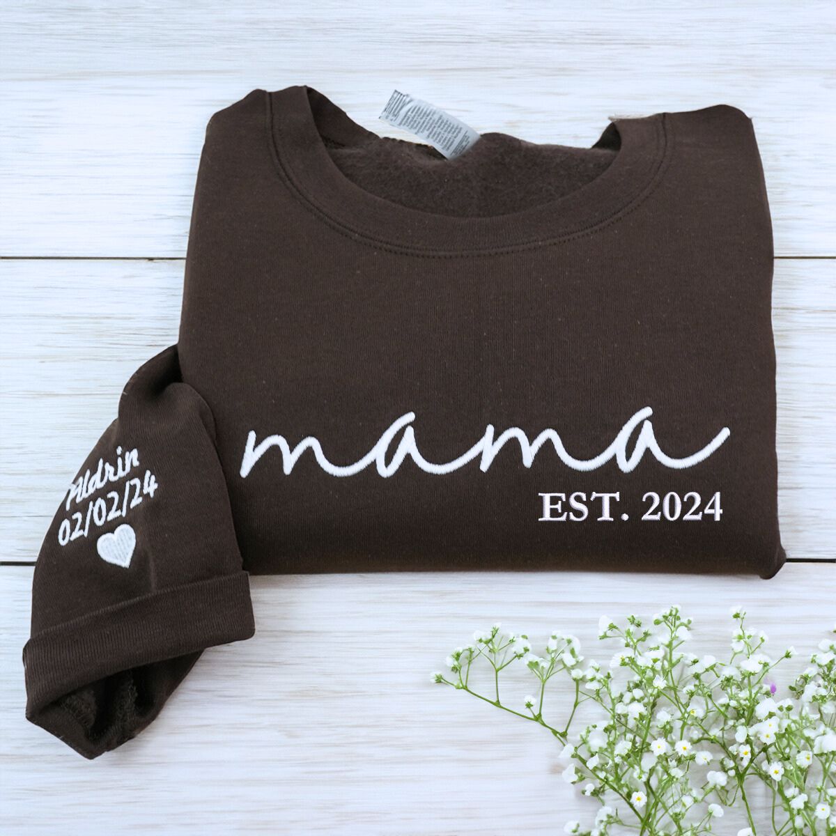 Folded Dark Chocolate Mama Sweatshirt with 'EST. 2024' embroidery and Kid's name on Sleeve, a meaningful gift for mama