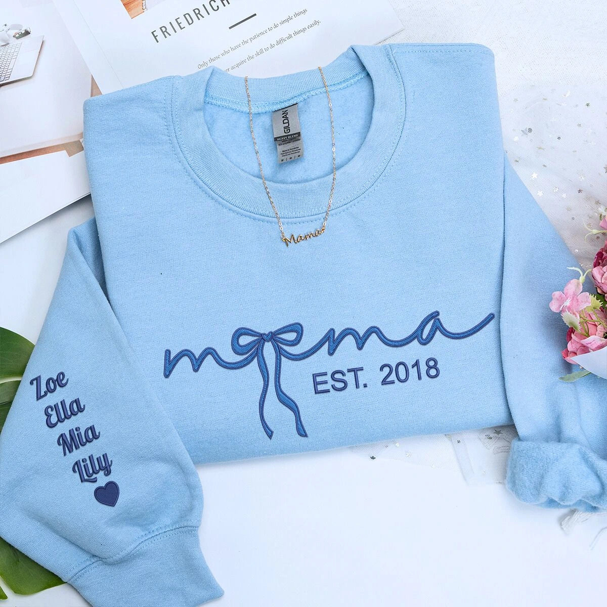 Mama Light Blue Sweatshirt with 'EST. 2018' and coquette bow embroidery with kids names on sleeve, a meaningful and cozy gift for mama