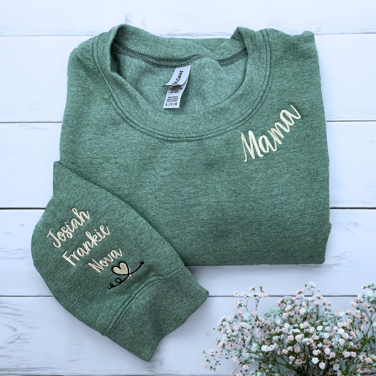 Folded Green Mama Sweatshirt with Names and Heart icon on Sleeve