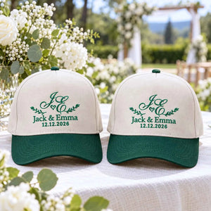 Matching custom bride and groom baseball caps with green monogram and wedding date