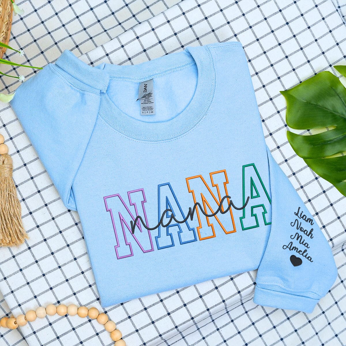 Light Blue Nana Colorful Text on Chest with Kids Names on Sleeve, a meaningful and cozy for Nana