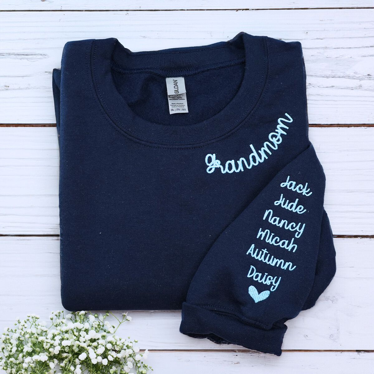 Folded Navy Grandmom Sweatshirt with Grandkids' Names on Sleeve, A Meaningful and cozy Gift for Grandmom 