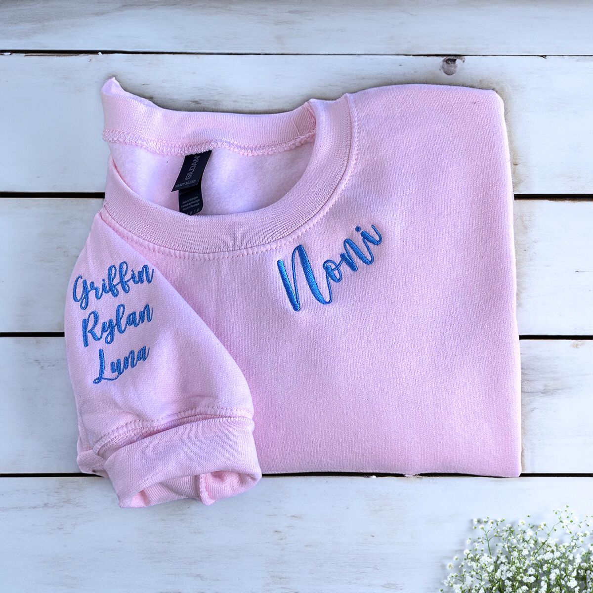 Noni Light Pink Sweatshirt with Grandkids' Names on Sleeve, a meaningful and cozy gift for Noni