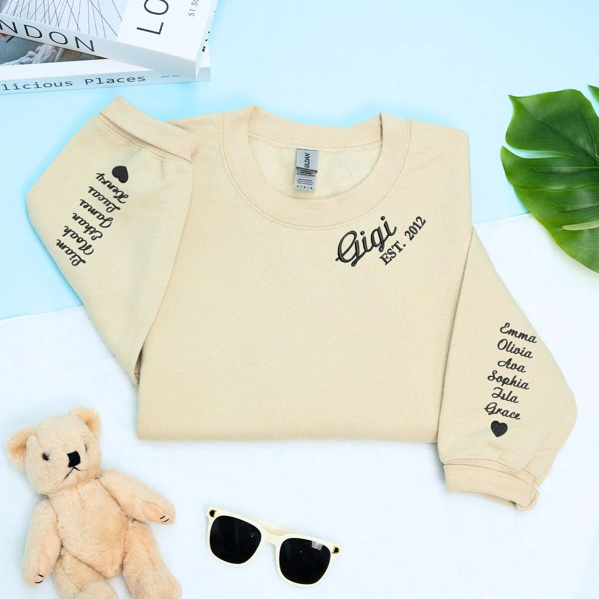 Sand Gigi Sweatshirt with 'Est. 2012' embroidery with grandkids names on sleeve, a meaningful and cozy gift for Gigi