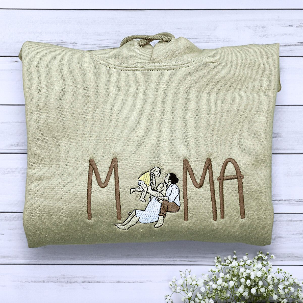 Folded Sand Mama Hoodie with Family Portrait Embroidery, a meaningful and cozy gift for Mama