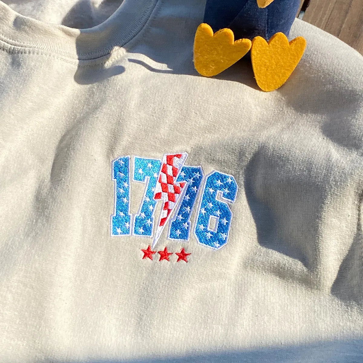 Embroidered 1776 Thunderstorm Sweatshirt on Fourth of July