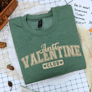 Embroidered Anti Valentine Club sweatshirt with custom sleeve text for self love