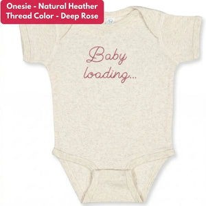 Embroidered baby announcement onesie with “Baby Loading” text for pregnancy reveal