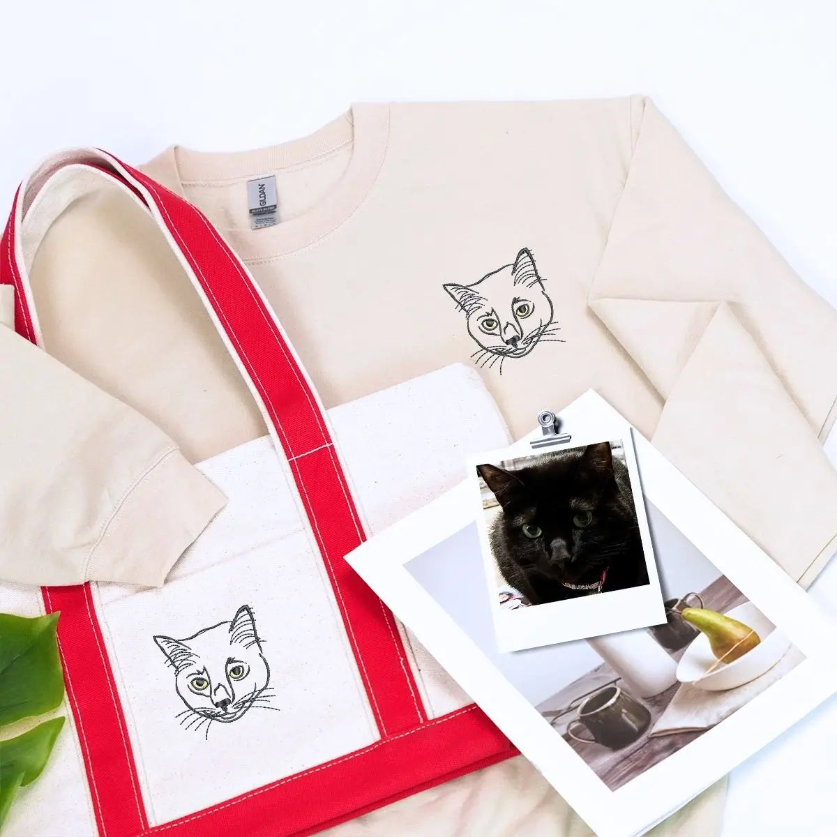 Cat lover gift set featuring cozy sweatshirt and embroidered canvas tote bag