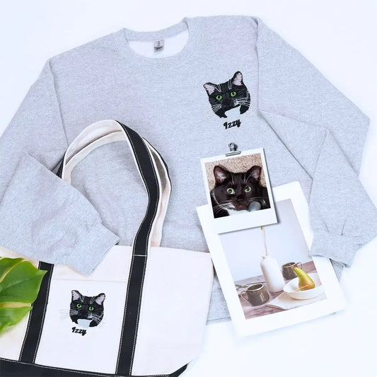 Cat lover gift set featuring cozy sweatshirt and embroidered canvas tote bag