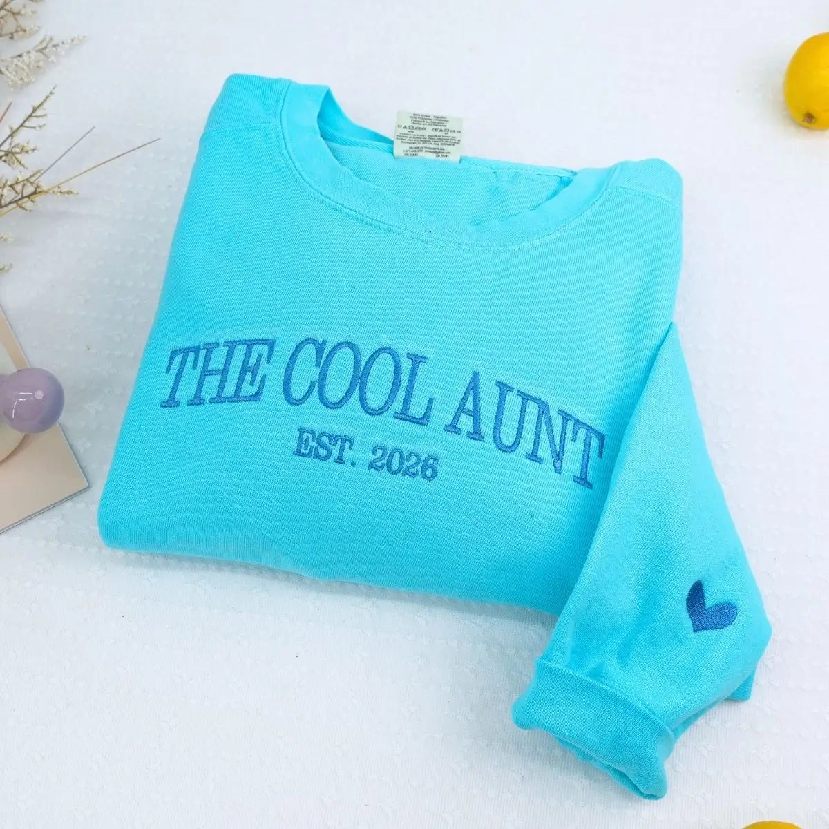 Custom embroidered sweatshirt with “Cool Aunt” text and Est. Year, cozy personalized gift for new or proud aunt.