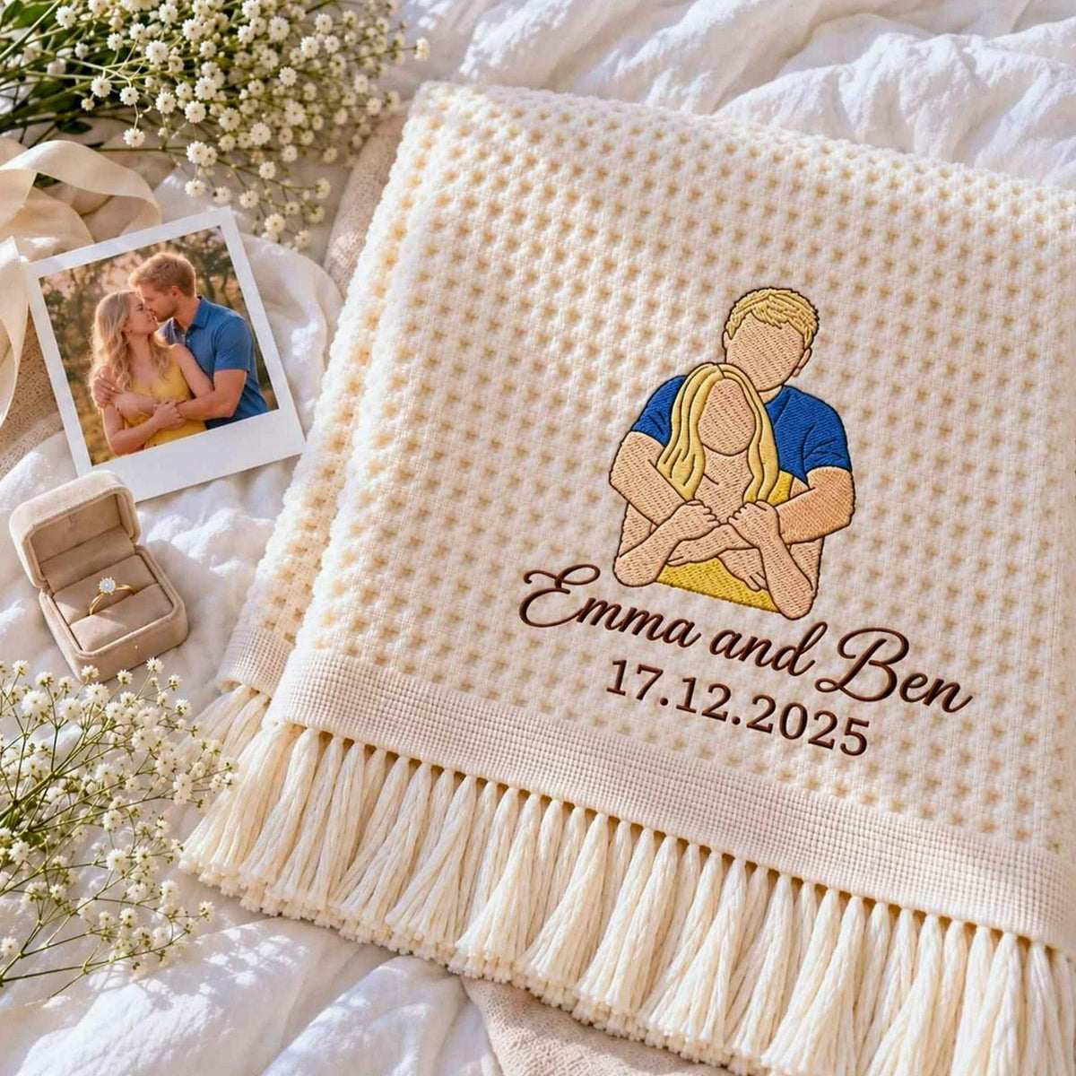 Cream waffle blanket embroidered with a custom color couple portrait, Emma and Ben names, and personalized date.