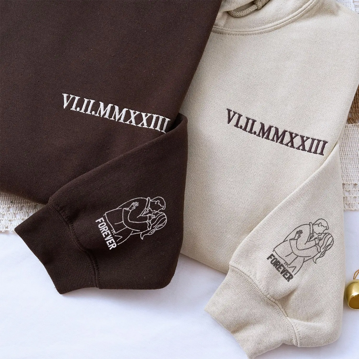 Custom anniversary hoodie for couple with embroidered Roman numeral date and personalized portrait artwork