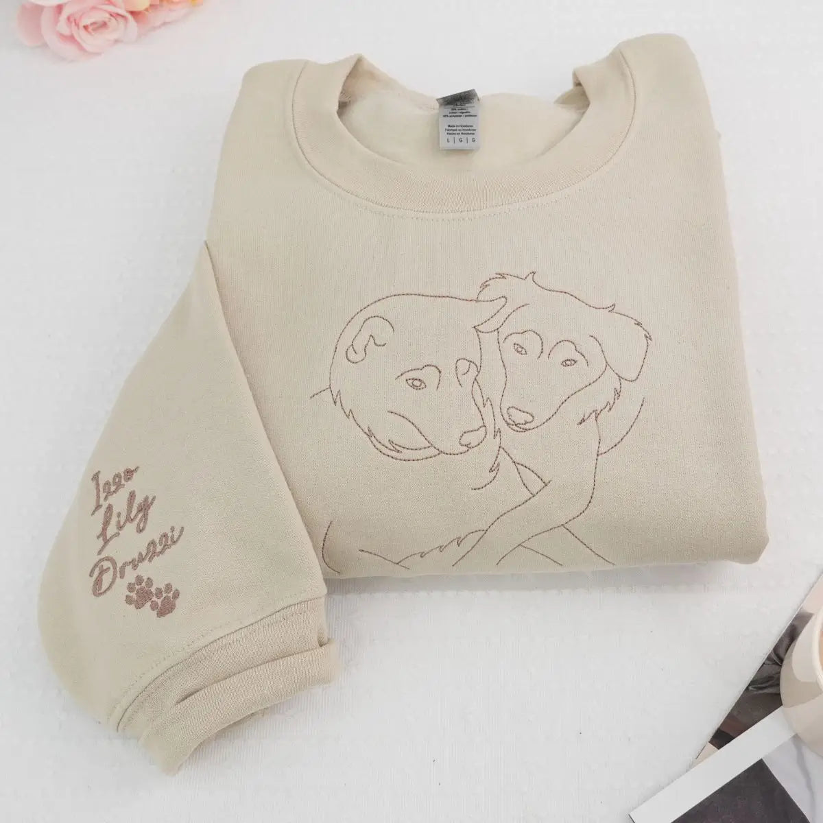 Custom embroidered shirt with Australian Shepherd portrait and name on sleeve