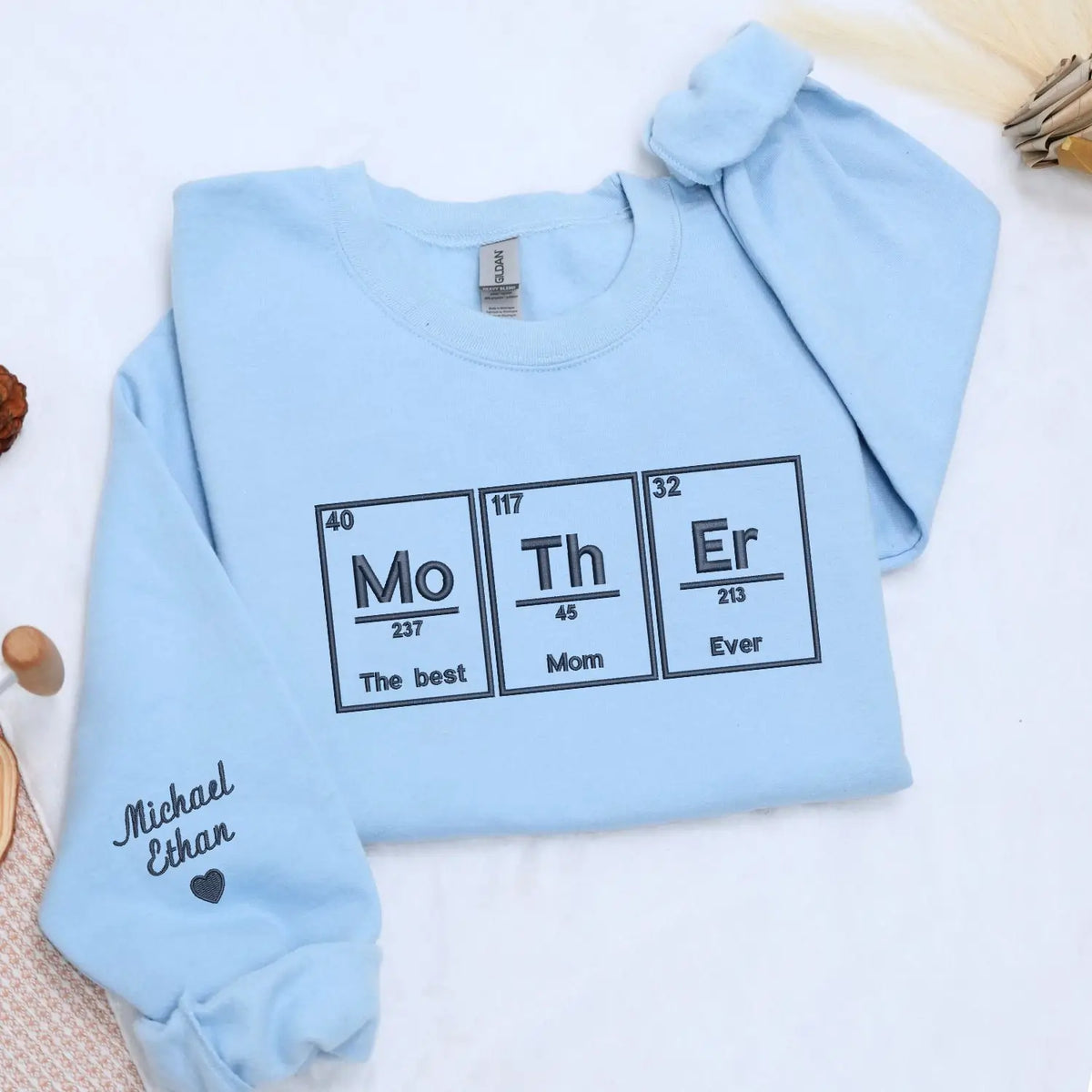 Custom embroidered Best Mom Ever sweatshirt with kids names stitched on sleeve for Mother's Day gift