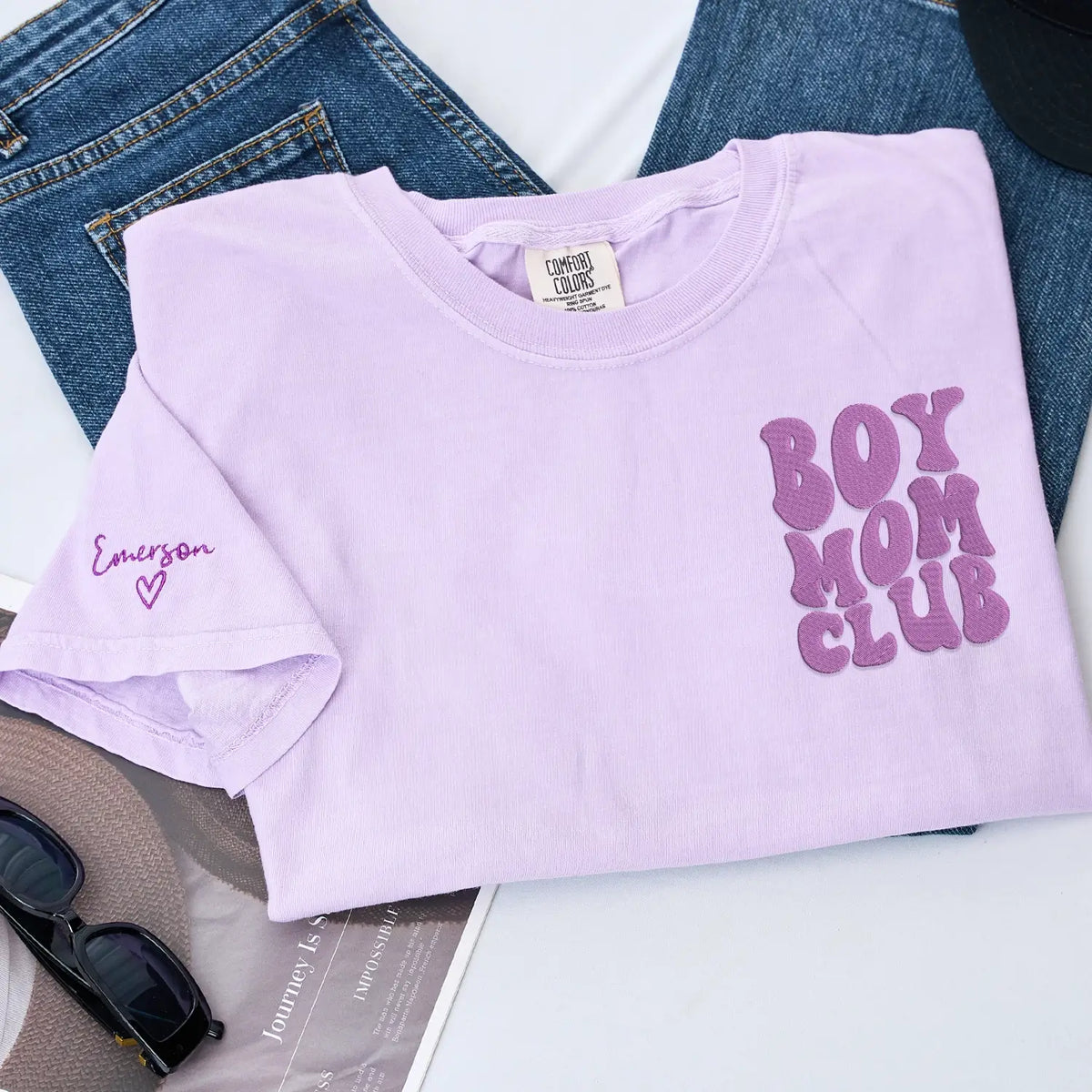 Custom embroidered boy mom shirt with kids names on sleeve personalized gift for new mother wearing casual outfit