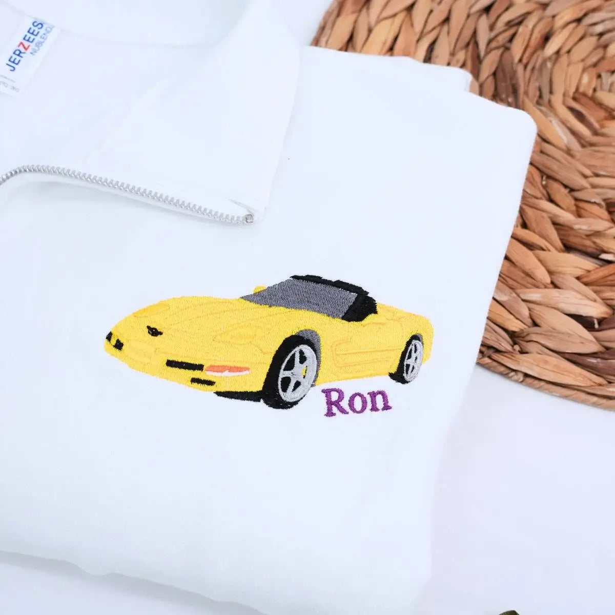 Embroidered car hoodie with zip-up front, featuring custom car portrait and sleeve text